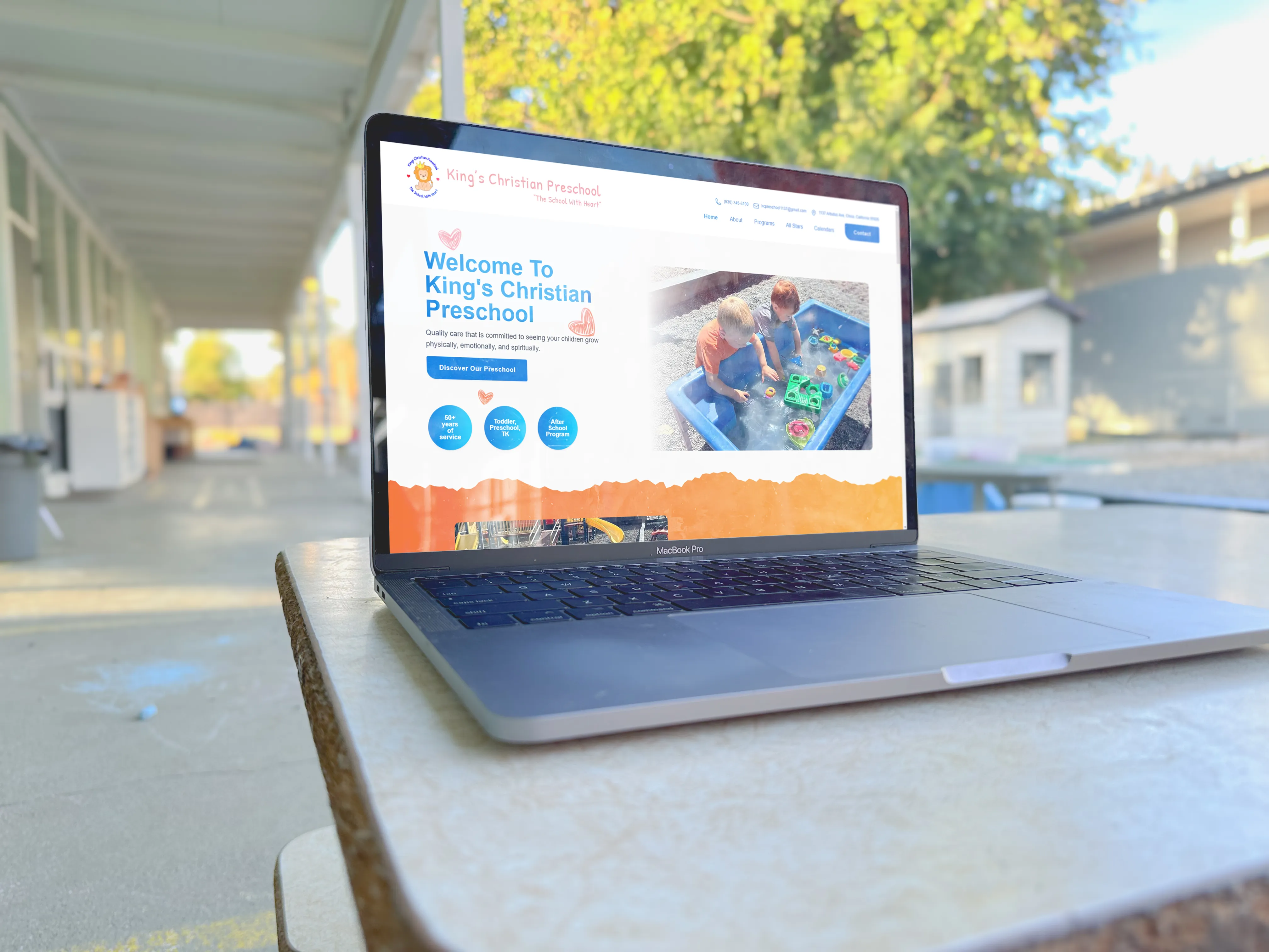 kings christian preschool homepage on a laptop